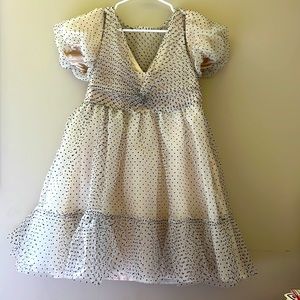 Black and cream tulle ruffle dress with puff sleeves